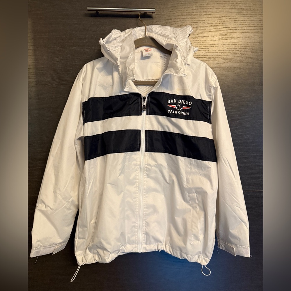 White rain and wind jacket with removable hoodie